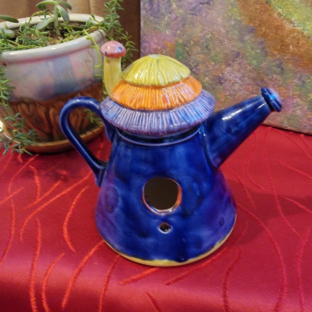 Painted pottery. Hummingbird house decor